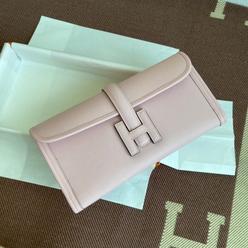 H**mes clutch bags